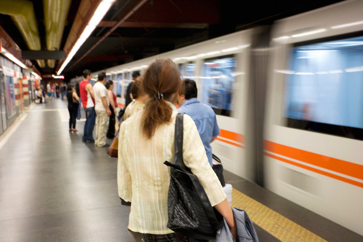 A Rome metro train at a station platform.